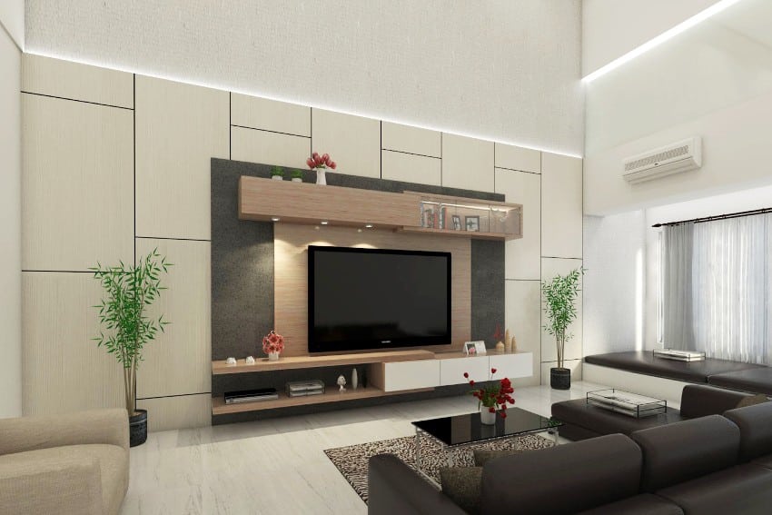 Room designed with wall strip lights, comfortable sofa and luxurious television paneling with minimalist table