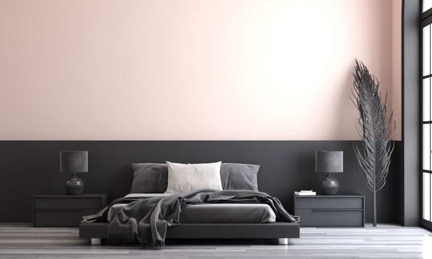 Minimalist bedroom with black and beige painted walls