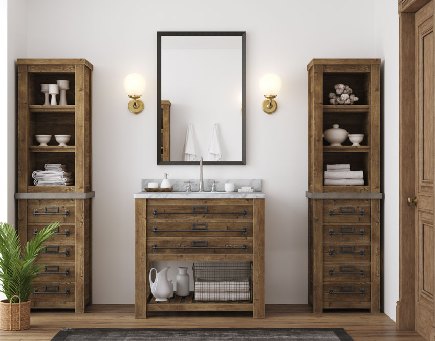 Rustic bathroom with mindi wood shelves, drawers, vanity mirror, sink, and countertop