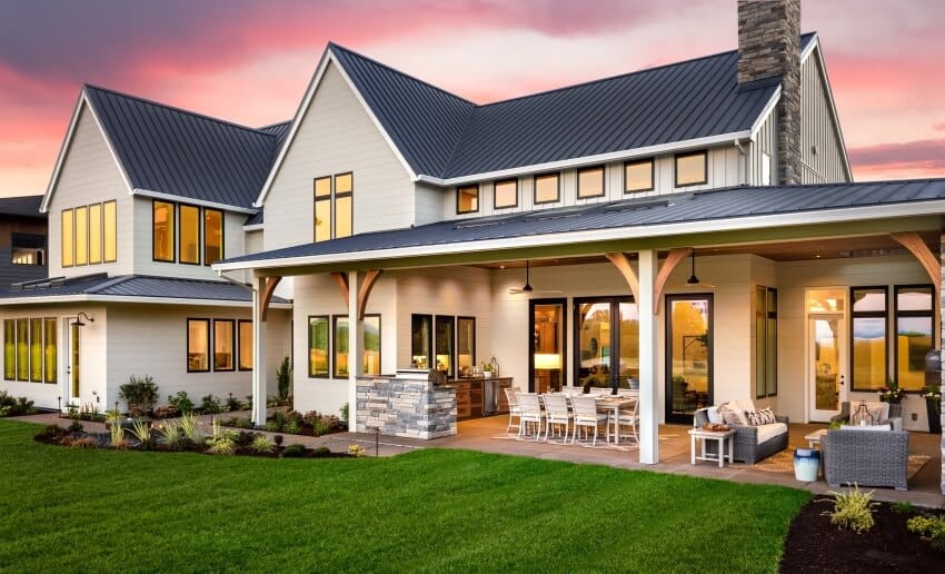 House with covered patio and outdoor kitchen, windows and doors