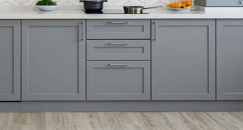 Dark gray kitchen cabinets with flat drawer front