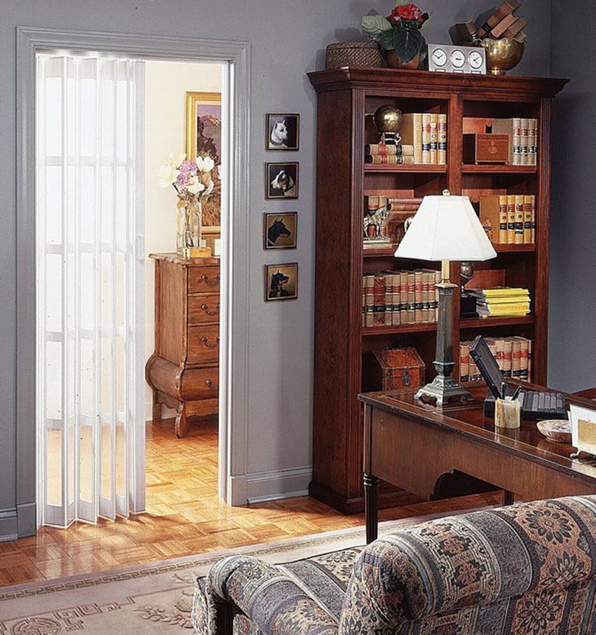 Clear vinyl door, bookshelf and table lamp