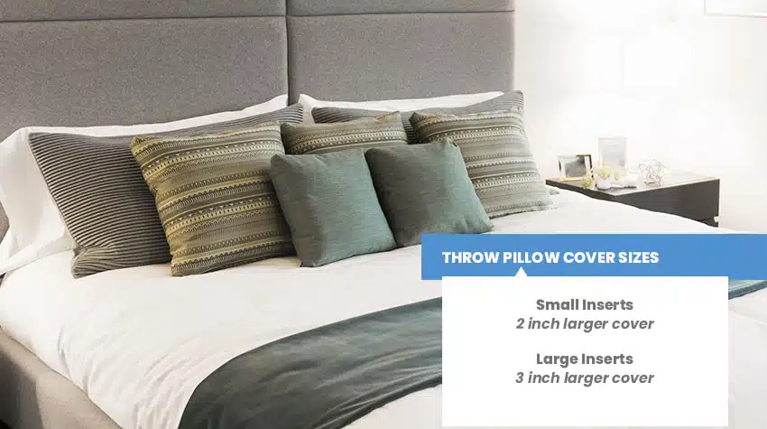 Gray headboard with pillows in different sizes