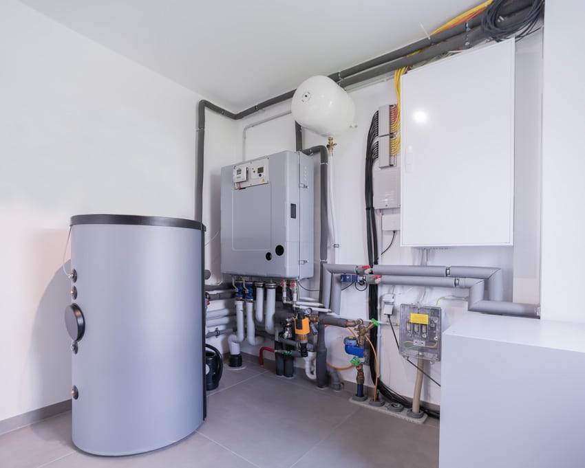 Basement interior with hybrid water heater for home usage