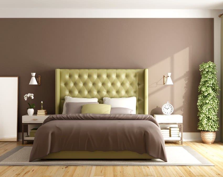 Brown and green master bedroom with elegant double bed