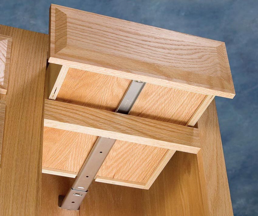 Center mount slide installed on a wood drawer