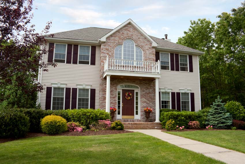 Colonial house with stone accent wall