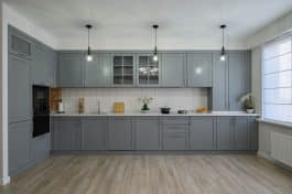 Contemporary Kitchen With White Chevron Tile Backsplash Wood Flooring Gray Cabinets Pendant Lights And Windows Is 265x176 