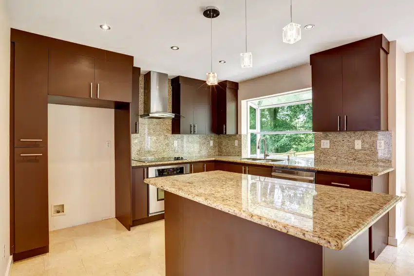 Contemporary kitchen with wood cabinets, reglazed countertops, backsplash, window, pendant light, and range hood
