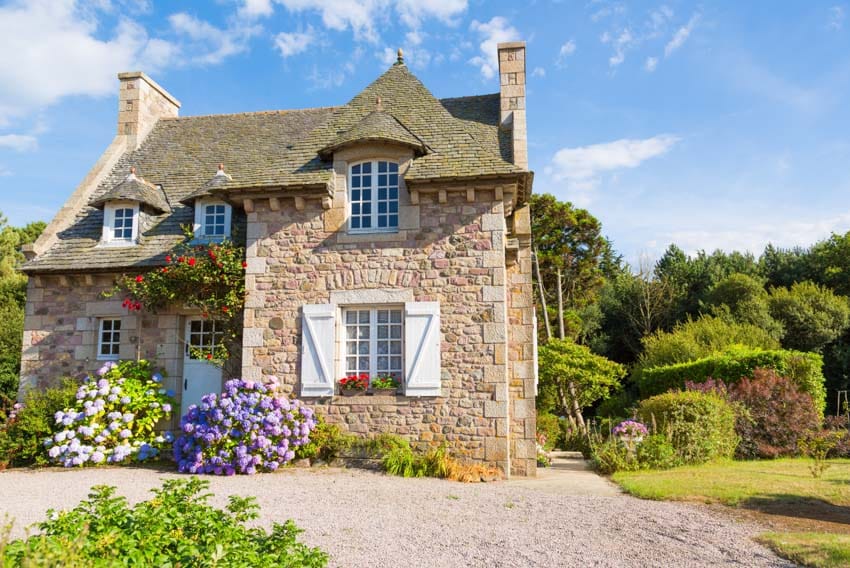 French country house with gravel garden