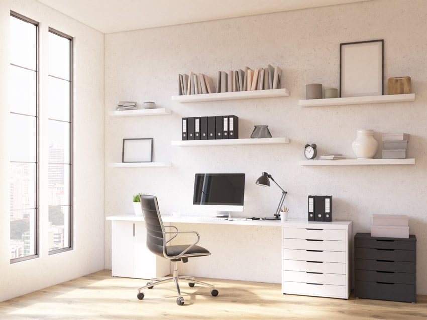 Home office with filing cabinets and floating shelves