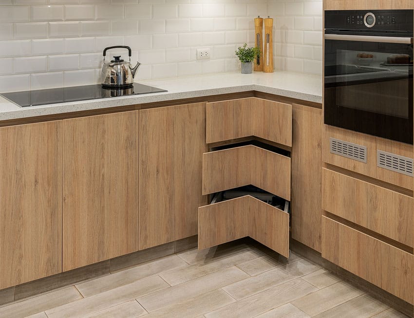 Kitchen corner cabinet with three-tier drawers