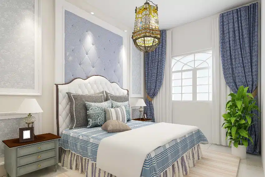 Light bedroom interior with powder blue and white tones features comfy bed, stylish ceiling lamp and portiere curtains