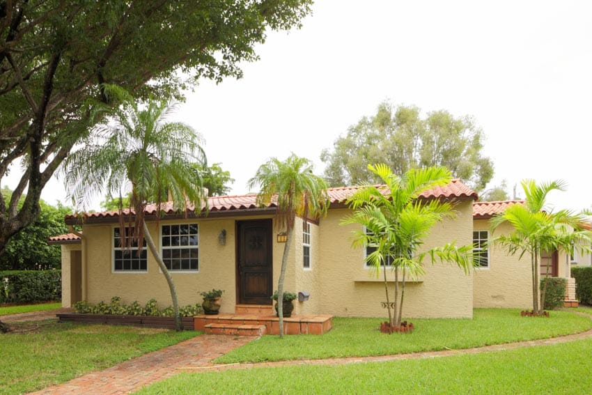 Mission bungalow home with stucco walls