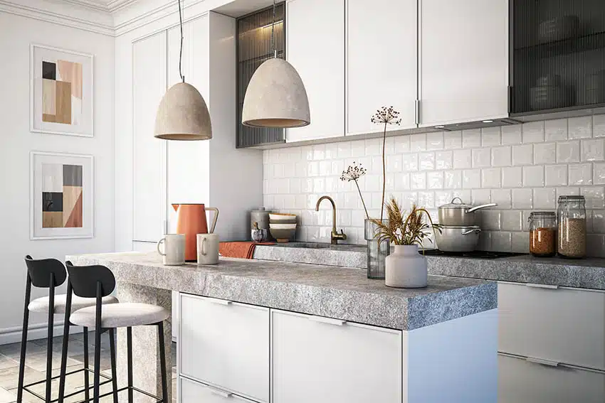 Modern kitchen with glazed square backsplash tile white cabinets concrete countertops