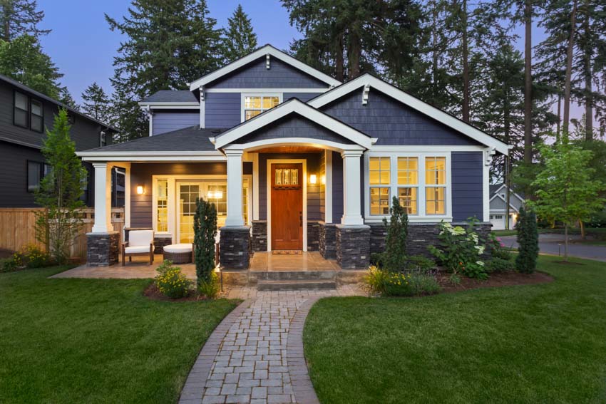 Modern house design with blue shingles on walls