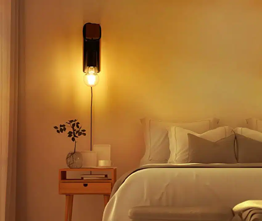 Plug-in sconce, nightstand and pillows