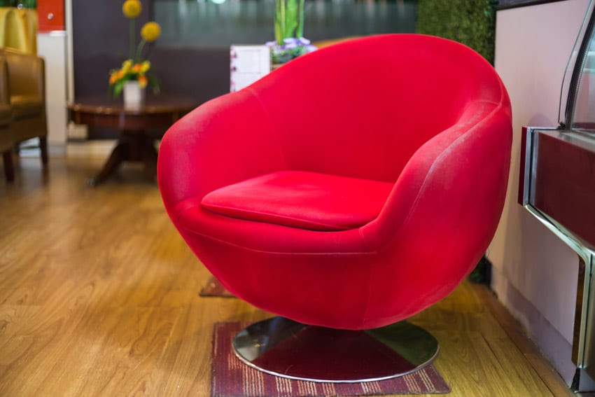 Red swivel chair for home interiors