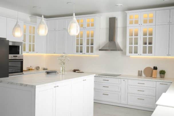 What Are The Different Options For Formica Kitchen Countertops   Beautiful White Kitchen Interior With Pendant Lights And Formica Countertops Ss 608x406 