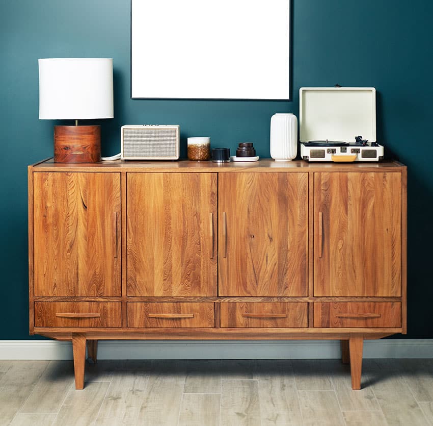 Credenza with lampshade candle trays dark teal paint