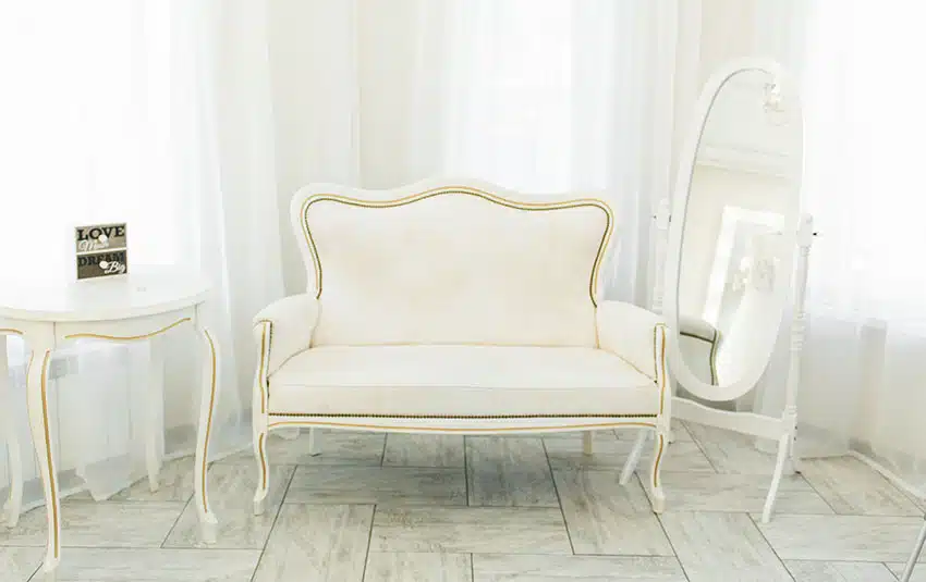 Elegant white upholstered settee herringbone floor