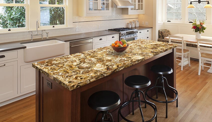 Kitchen with petrified wood kitchen island countertop farmhouse sink bar stools