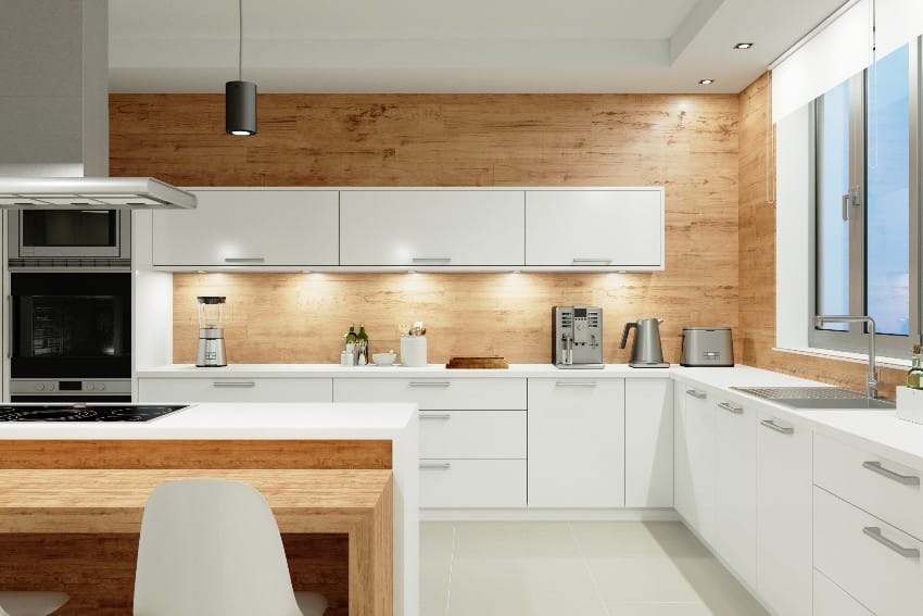 Beautiful kitchen interior with bright lighting cabinets and wooden japandi kitchen table