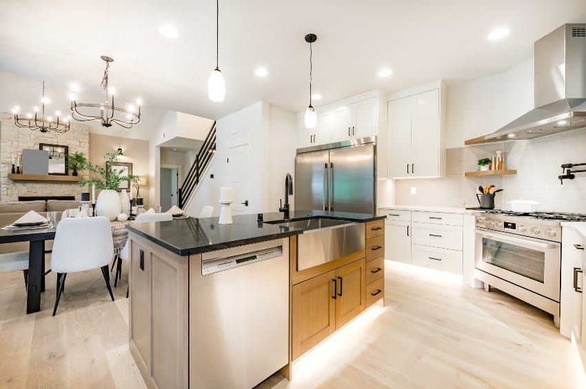 Beautiful modern kitchen dining and living room in new contemporary style luxury home