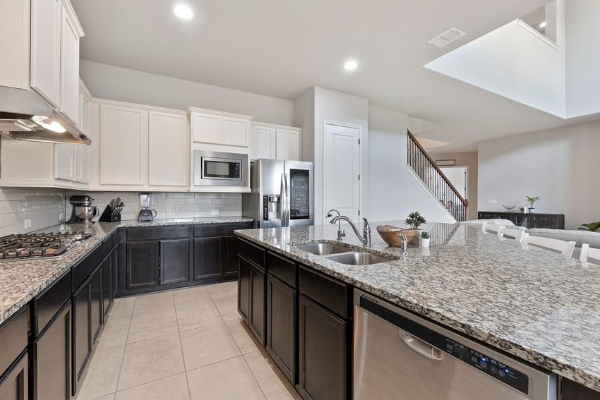 Kitchen with large format ceramic flooring