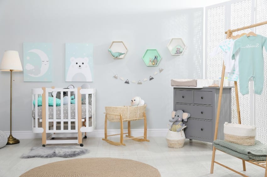 Cute and cozy baby room with crib and other organic baby furniture