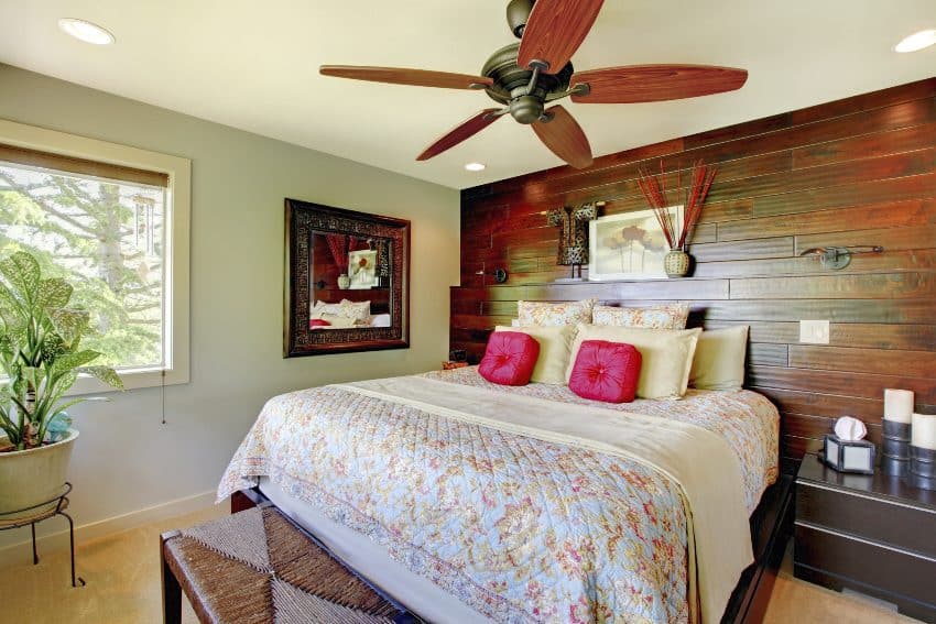 Elegant cottage bedroom style with wooden accent, ceiling fan and comfortable bed
