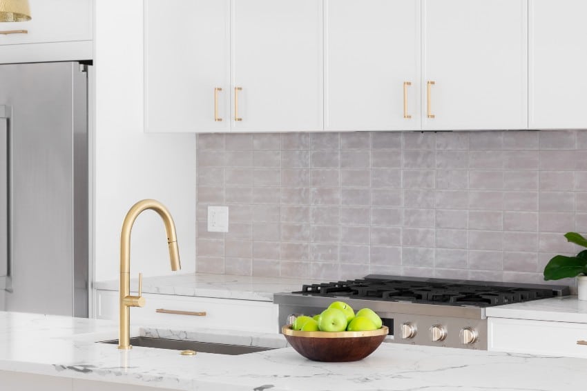 Gorgeous formica calacatta marble countertops with gold finish faucet