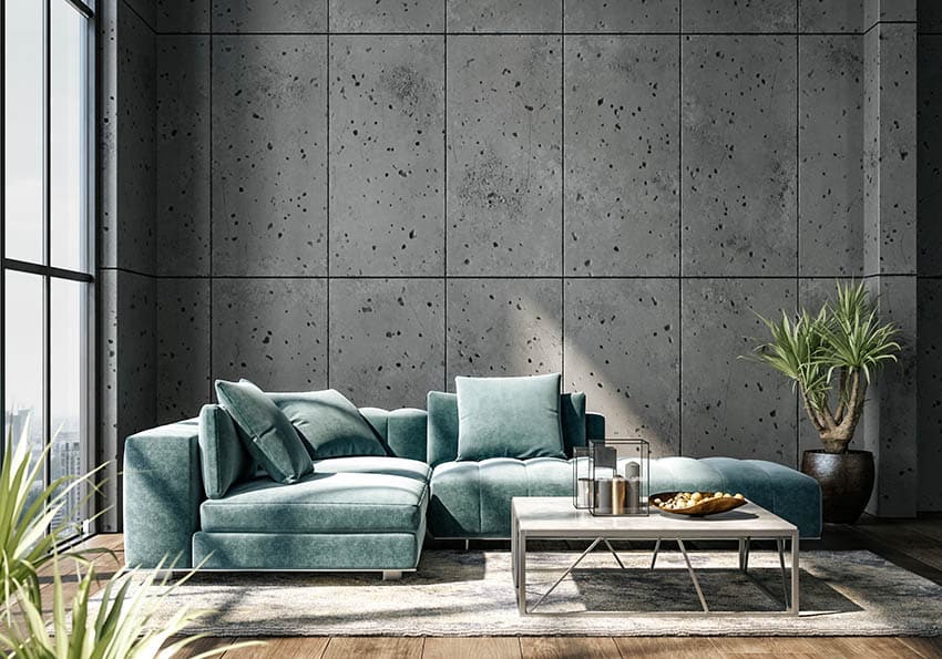 Gray wall, light blue green sectional and square center table