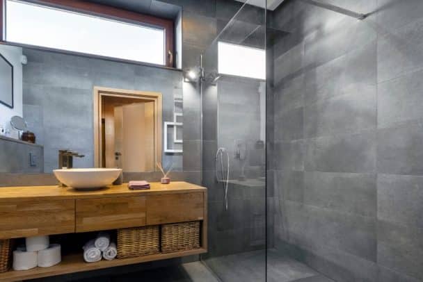 Vinyl Shower Walls Panels Tiles Planks   Modern Bathroom In Gray Vinyl Walls And Wooden Counter Ss 608x406 