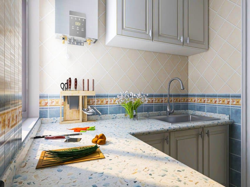 Bright kitchen with diamond tile backsplash, sink faucet, terrazzo countertop and cabinets