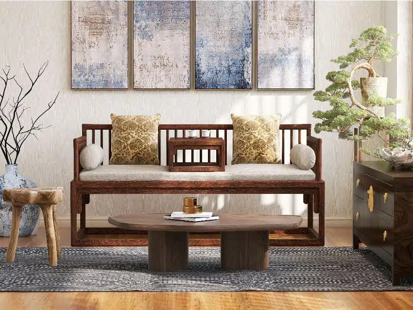 Contemporary Asian living room interior with Stickley wooden sofa seat, antique cabinet, Japanese bonsai tree and tea set on coffee table