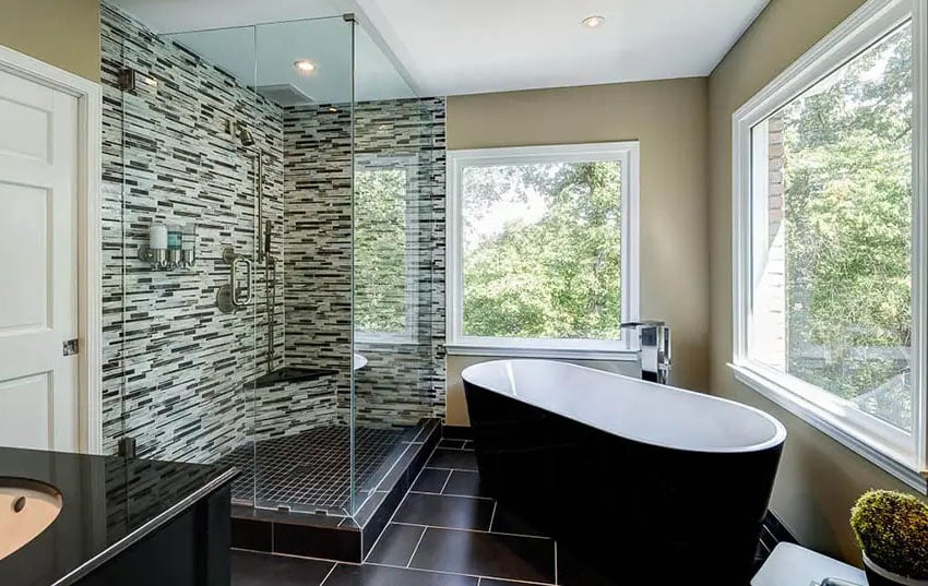 Contemporary master bathroom with shower and granite bench seat