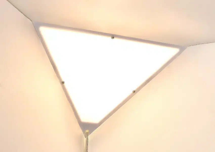 Corner light fixture for small hallways