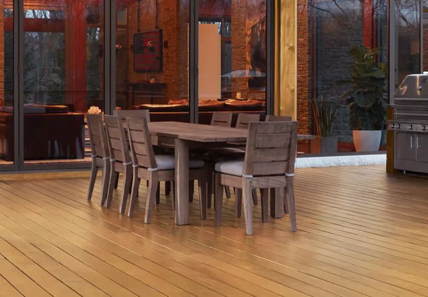 Dining room with oil-based polyurethane wood floor finish, table, and chairs