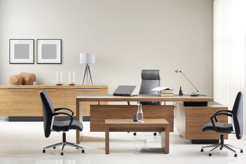 executive office furniture including executive desk, chairs, lamps, and cabinets