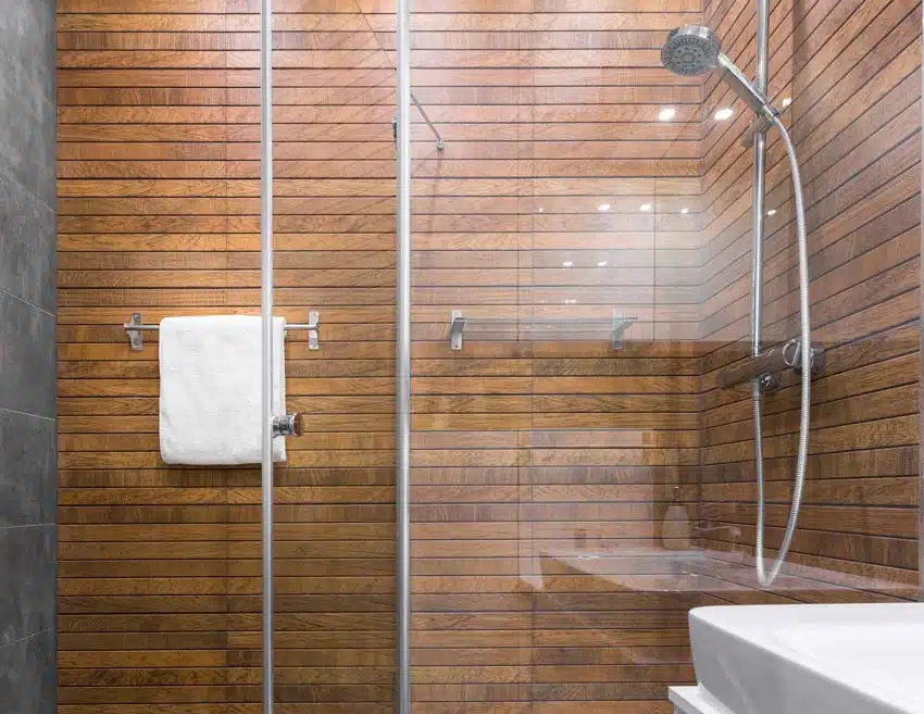 Industrial bathroom with concrete wall, and thin shiplap 