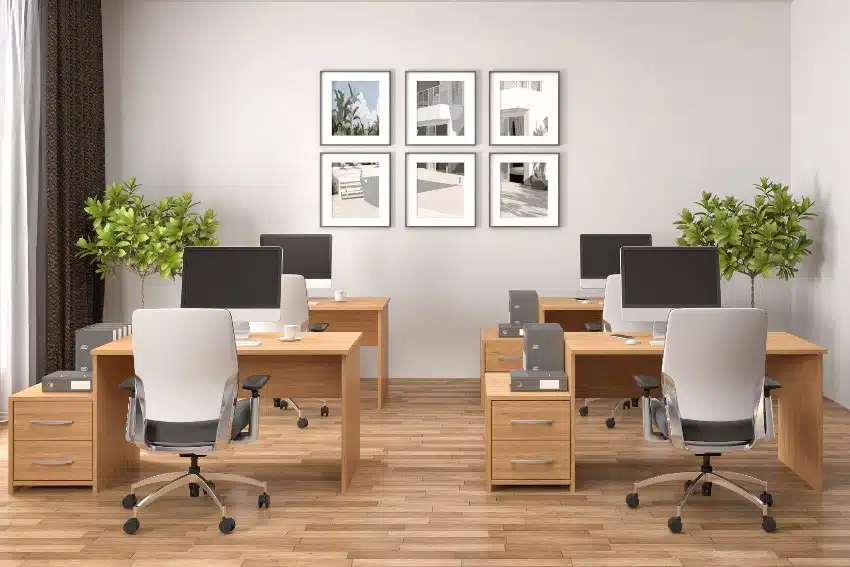 Modern minimalist office interior with computer desk and chairs
