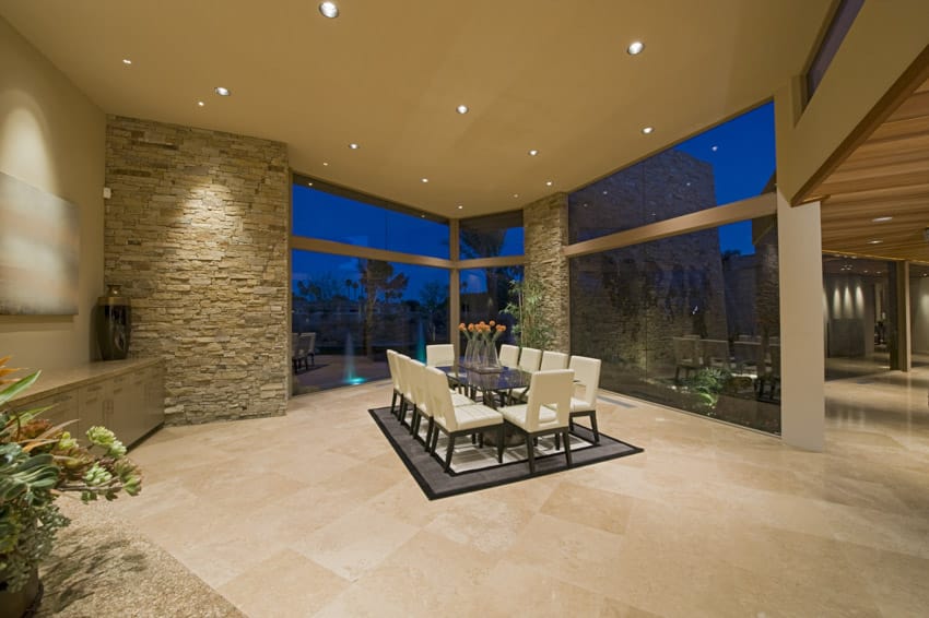 Spacious dining area with slate stone tiles, and travertine tiles