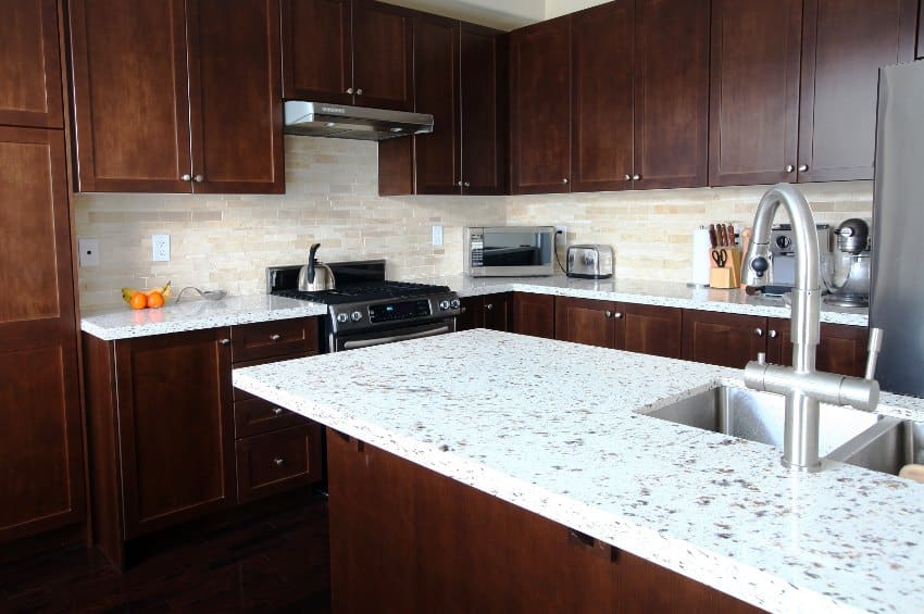 Traditional kitchen with hardwood cabinets and terrazzo countertops