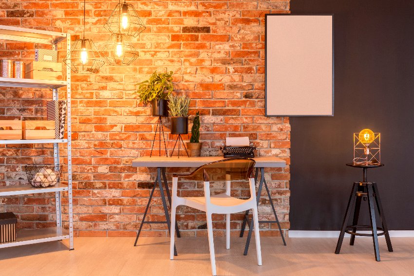 Interior features romantic warm lighting with brick wall