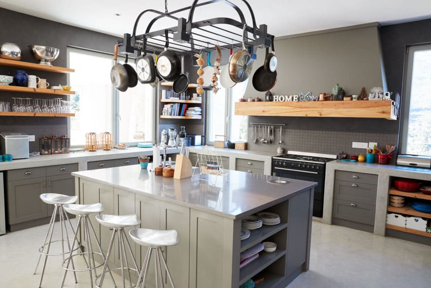 Industrial kitchen with hanging pot and pan rack