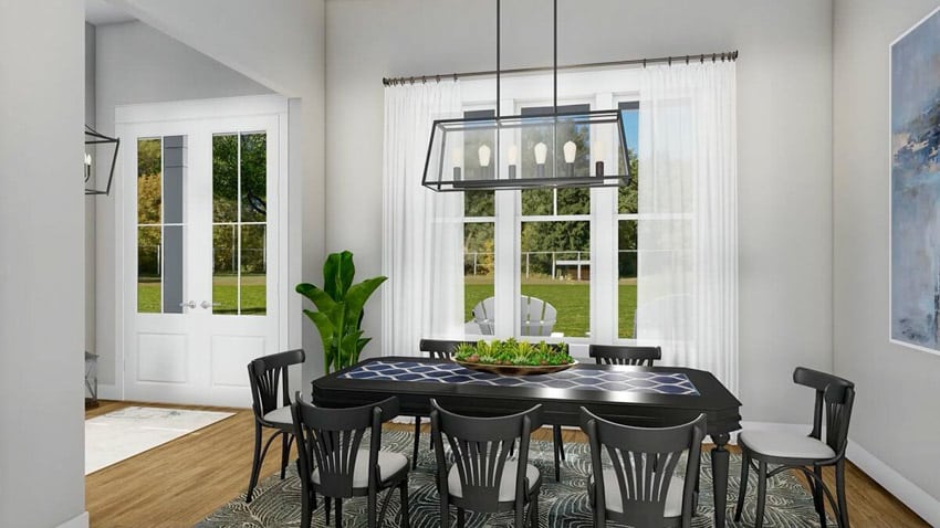 Modern farmhouse dining room with table, chairs, and pendant lights
