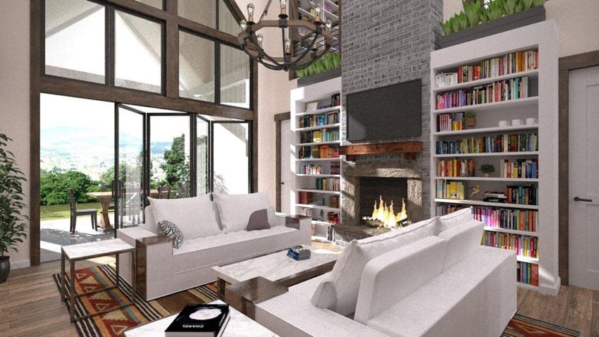 Modern farmhouse living room with sofas, fireplace, bookshelves, side table, folding glass doors, coffee table, and chandelier