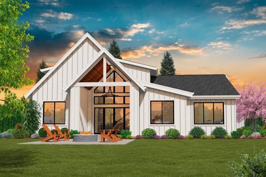 Modern farmhouse exterior with vertical shiplap siding, front porch, outdoor patio, fire pit, and lounge chairs