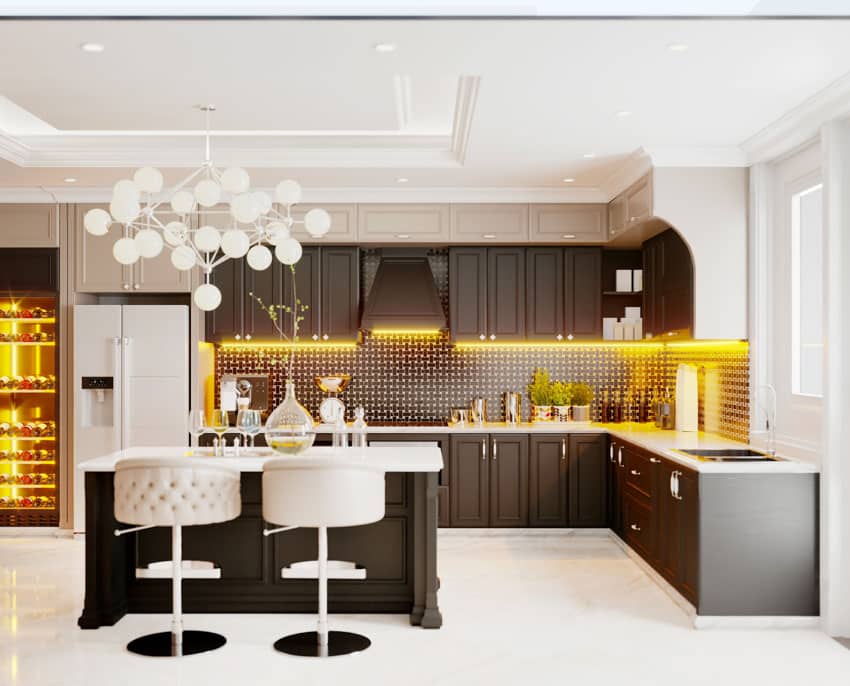 Contemporary kitchen with underlit cabinets, and mosaic backsplash with tufted stools